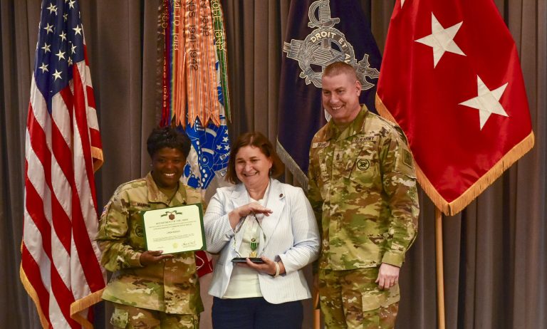 Linda Nogle is the first U.S. Army Combat Capabilities Development Command employee to win the Inspector General of the Year award after a grueling three-day competition at the Pentagon. She competed for the annual title against nine other Army inspectors general and won the Department of the Army Civilian (GS-12/13) IG of the Year award category. Nogle attended the Worldwide Inspector General Conference in Little Rock, Arkansas, May 23, 2023. Here she is flanked by Lt. Gen. Donna Martin, inspector general of the Army (left) and Command Sgt. Maj. Larry Orvis, inspector general sergeant major (right). (Photo courtesy: Thomas Ruyle).